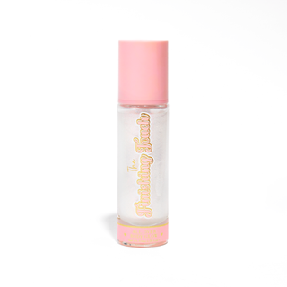 Pink bottle of P.Louise Finishing Touch All Over body glow on a white background