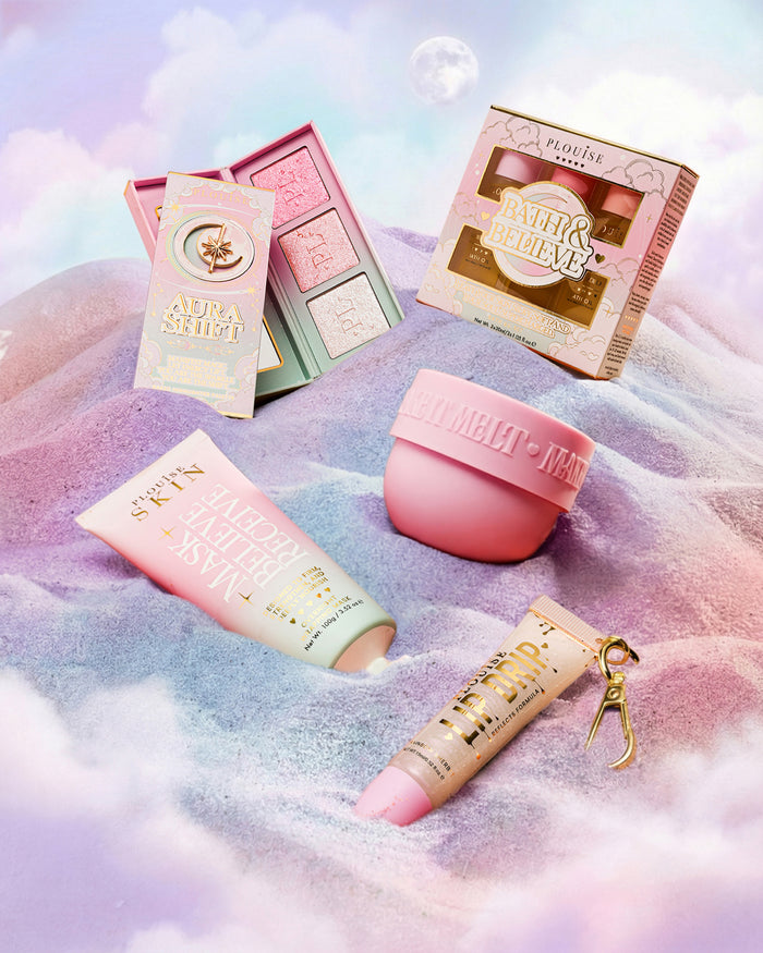 The P.Louise Manifest Under The Moon Glow Skin Kit featuring a highlighter palette, shimmer lip gloss, overnight face mask, makeup cleansing balm and bath oil trio