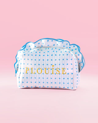 Blue and white striped P.Louise blue raspberry makeup and skincare bag with frills and a blue raspberry design