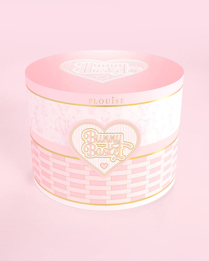 P.Louise Pink and white easter basket with 'Bunny Basket' logo on a pink background