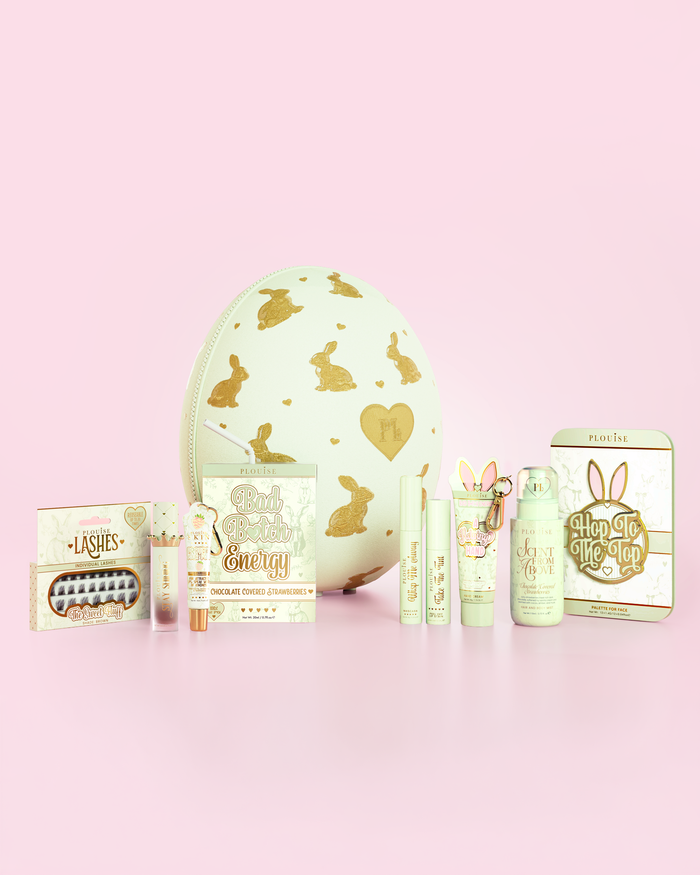 Green P.Louise Easter Egg in Chocolate Strawberry scent with green makeup skincare and beauty products in front