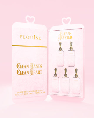An open P.Louise hand sanitizer gift set containing 5 sprays in different cherry scents