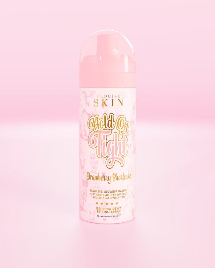Pink bottle of P.Louise Hond On Tight gripping dewy setting spray in strawberry shortcake