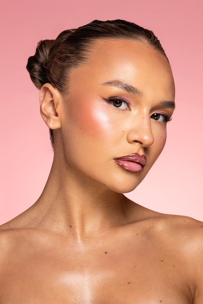 P.Louise 11:11 Shimmer Liquid Highlighter on a model