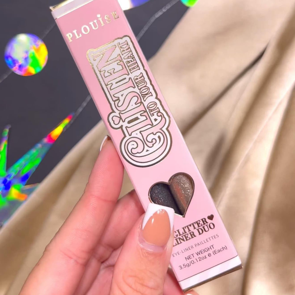 Box of P.Louise Glisten To Your Heart Liquid Glitter Eyeliner Set in Midnight Muse variant held by a hand