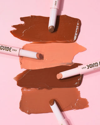 P.Louise Glow Guide Glossy Lipstick Balms with color swatches on a pink background