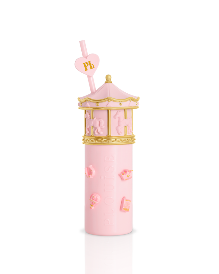 A pink cylindrical tumbler with a carousel-themed lid and a pink heart-shaped straw featuring the letters 'PL', set against a plain white background.