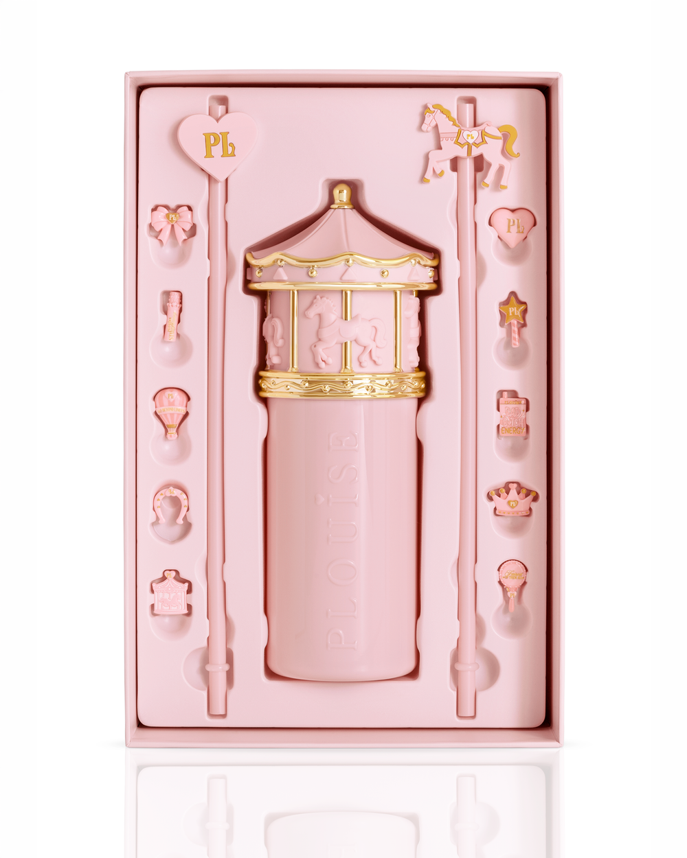 A pink carousel-themed drinking cup gift set in a matching box, featuring a cylindrical pink bottle with gold trim, two long pink straws decorated with small pink icons, and a central carousel figure, all on a white background.