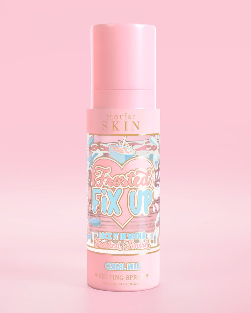Pink bottle of P. Louise Skin Breakfast Frosted Fix Up Blurring Setting Spray in Cereal Milk scent infused with skincare on a pink background